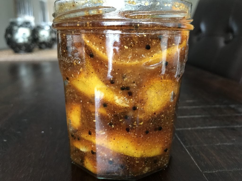Indian spiced Meyer Lemon Pickle in a glass jar