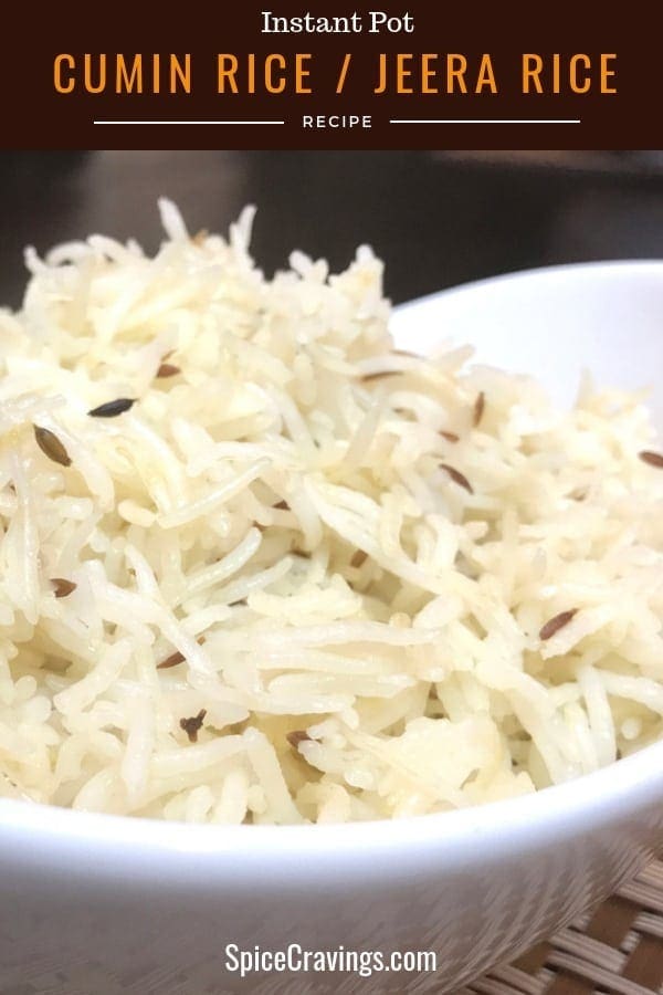 Fluffy Indian rice with cumin in white bowl