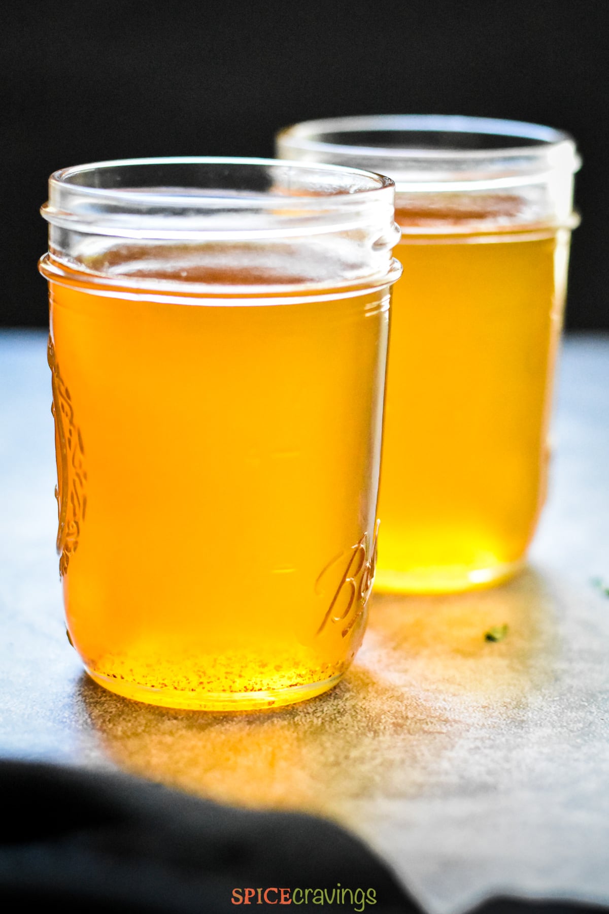 ghee poured in two mason jars