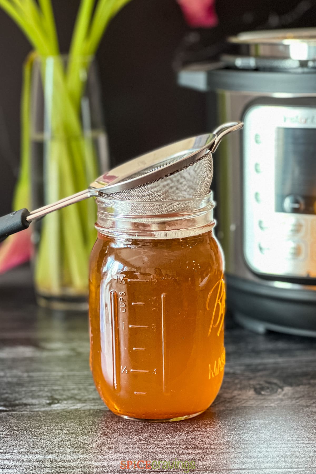 homemade ghee in two glass jars