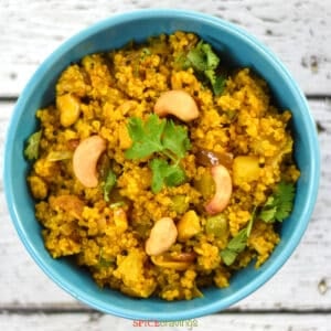 Curried quinoa in blue bowl