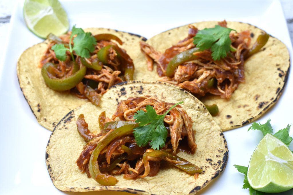 This is the QUICKEST Pulled Chicken Fajita Tacos recipe ever! Juicy and fall-apart tender chicken seasoned with Mexican chili powder, smoked paprika and earthy cumin, soaked in sweet and tangy salsa, folded in a fire grilled corn tortilla, now that's a recipe for a party in your mouth! #food #foodie #foodblogger #delicious #recipe #instantpot #recipes #easyrecipe #cuisine #30minutemeal #instagood #foodphotography #tasty 