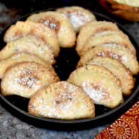 baked turnovers dusted with powder sugar