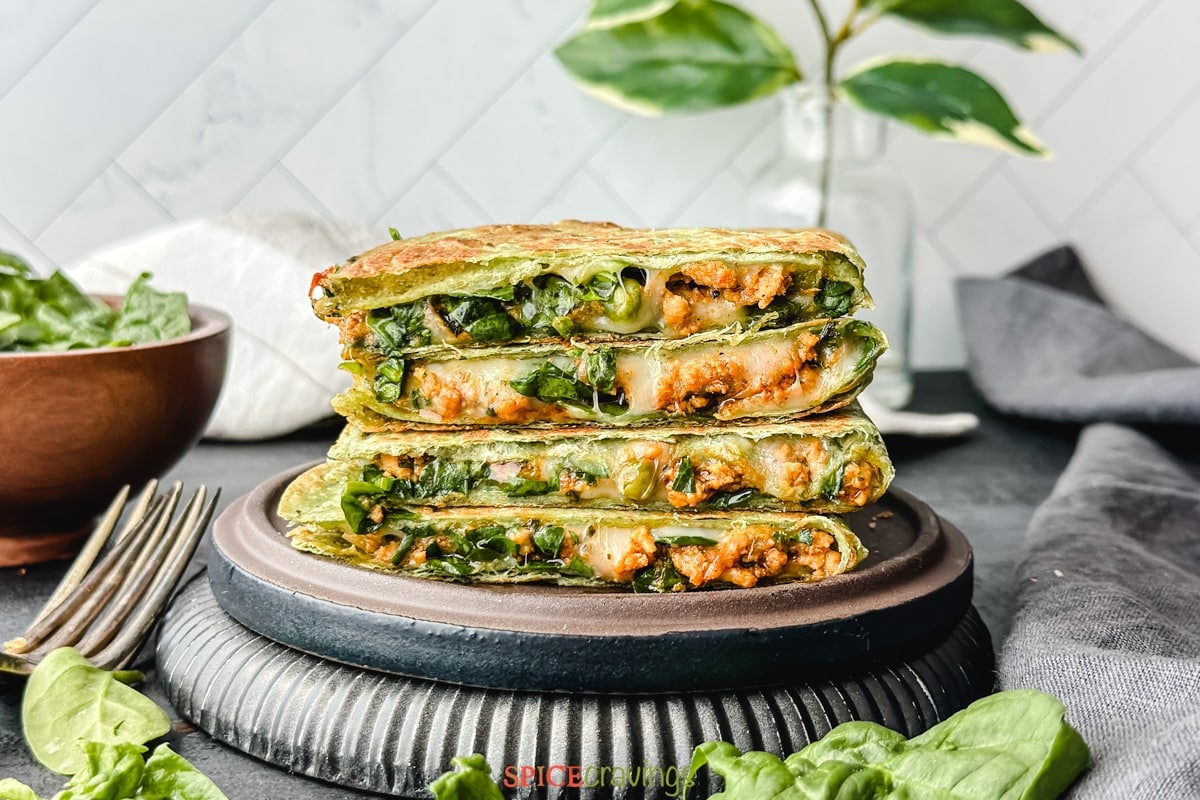 Indian spiced meat and peas quesadilla, cut in slices