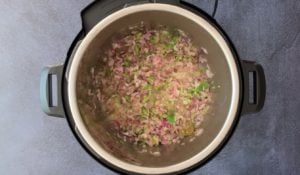 Sauteing onion, garlic, ginger and green chili
