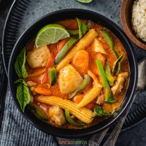 Thai panang curry in a black bowl