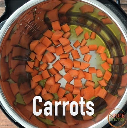 Adding chopped carrots to oil in the Instant Pot