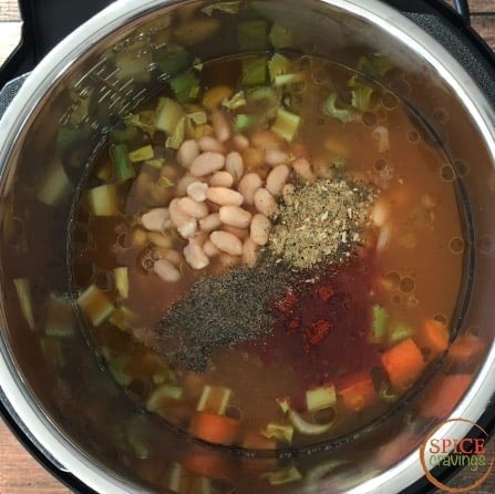Adding spices to the soup