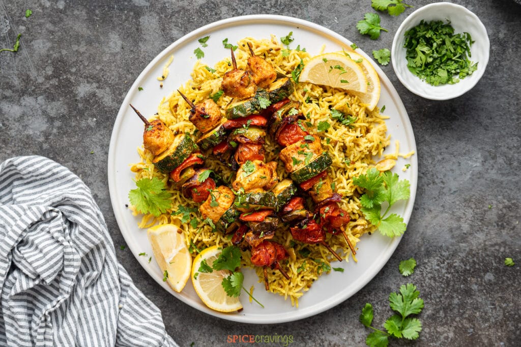 Chicken Skewers & Vegetables with Lemon Rice, made in Instant Pot by Spice Cravings. A delicious complete meal that comes together in under 30 minutes. #food #foodie #foodblogger #delicious #recipe #instantpot #recipes #easyrecipe #cuisine #30minutemeal #instagood #foodphotography #tasty #Chicken #grill #kebab