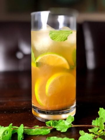 Indian spiced mojito served on ice, garnished with mint leaves