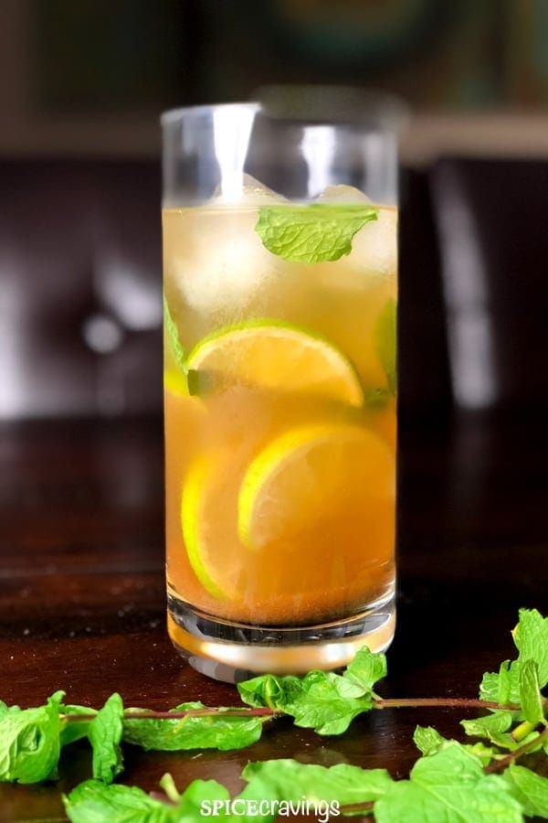Indian spiced mojito served on ice, garnished with mint leaves