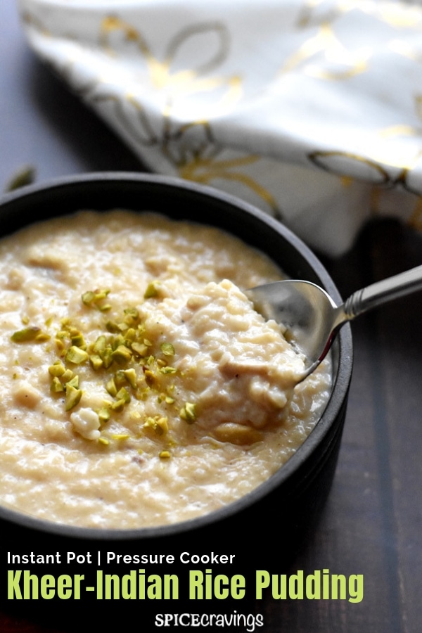 A bowl of Indian rice pudding with chopped pistachios on top
