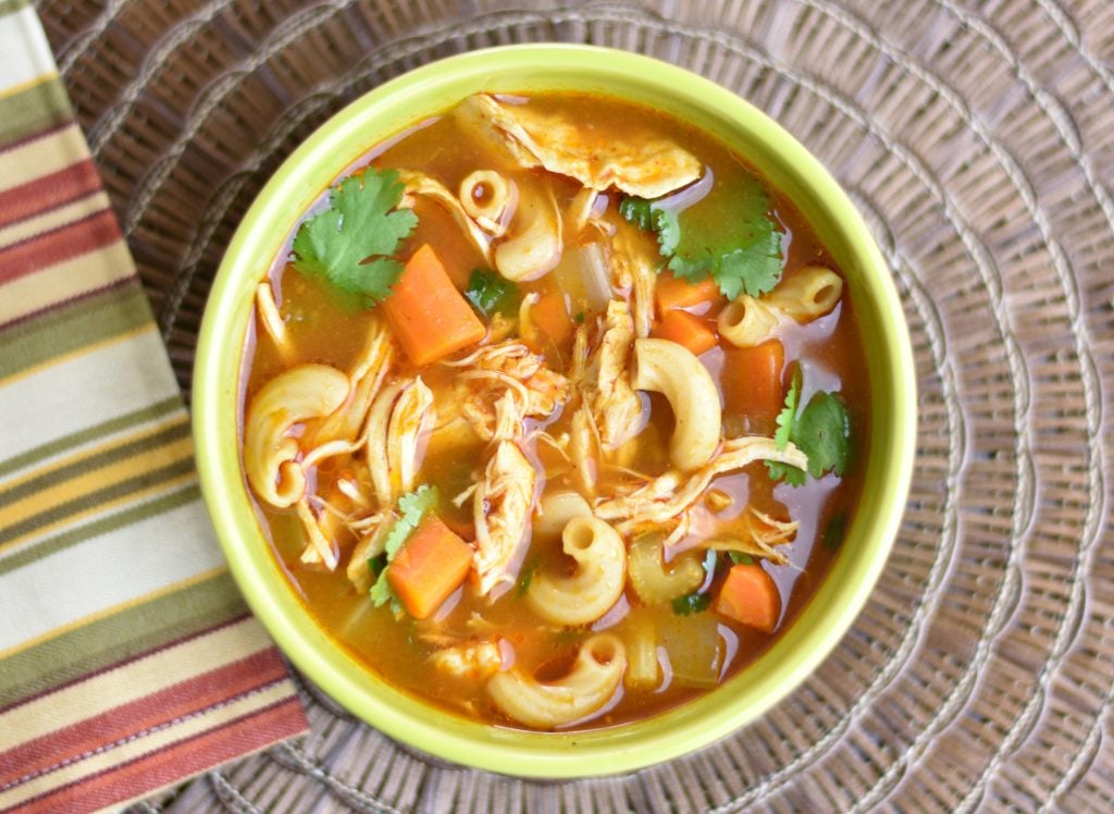 Instant pot Chicken Noodle Soup with Ethiopian spices by Spice Cravings. This classic Chicken Noodle soup is made by simmering chicken and vegetables, such as carrots and celery, spices, herbs and small noodles in chicken broth.  This recipe uses the Ethiopian Spice blend called Berbere Seasoning to enhance the flavor and made in an instant pot. #food #foodie #foodblogger #delicious #recipe #instantpot #recipes #easyrecipe #cuisine #30minutemeal #instagood #foodphotography #tasty