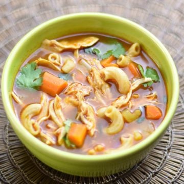 Instant pot Chicken Noodle Soup with Ethiopian spices by Spice Cravings. This classic Chicken Noodle soup is made by simmering chicken and vegetables, such as carrots and celery, spices, herbs and small noodles in chicken broth.  This recipe uses the Ethiopian Spice blend called Berbere Seasoning to enhance the flavor and made in an instant pot. #food #foodie #foodblogger #delicious #recipe #instantpot #recipes #easyrecipe #cuisine #30minutemeal #instagood #foodphotography #tasty