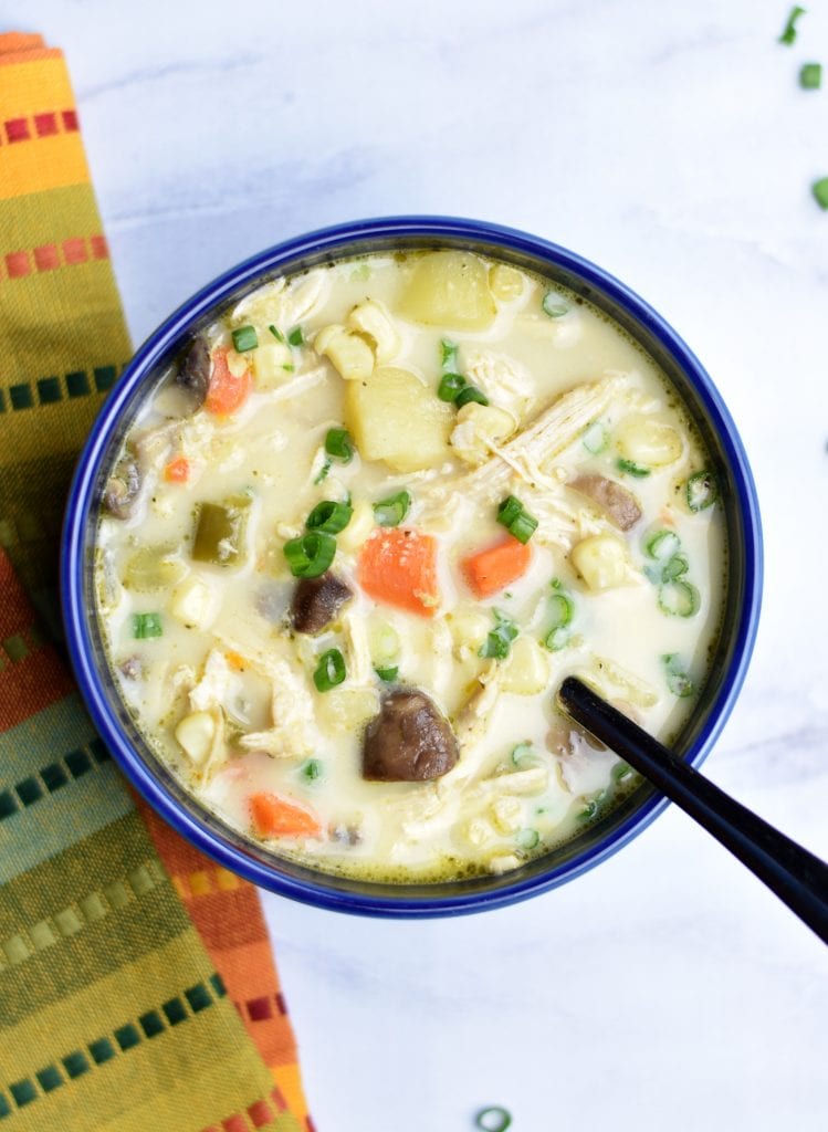 Gluten-Free Corn and Chicken Chowder in instant pot by Spice Cravings. Creamy, sweet, hearty and pure deliciousness in a bowl, that's how I would describe chowder. Enjoy in the summer or the winter by the fireplace on a cold winter night with a bowl of this Gluten-Free Corn & Chicken Chowder! This recipe reduces the carbs and goes gluten-free by removing the roux. #food #foodie #foodblogger #delicious #recipe #instantpot #recipes #easyrecipe #cuisine #30minutemeal #instagood #foodphotography #tasty