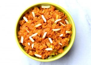 Instant Pot Carrot Halwa Gajar ka Halwa by Spice Cravings. Carrot Halwa or Gajar ka halwa is a dessert from Punjab, in the Indian subcontinent. It's consistency is between a fudge and a pudding. It is made by slow cooking grated carrots with milk and sugar, flavored with cardamom and saffron and garnished with chopped almonds and cashews. A perfect comfort dessert for winters. #food #foodie #foodblogger #delicious #recipe #instantpot #recipes #easyrecipe #cuisine #30minutemeal #instagood #foodphotography #tasty