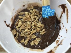 Add chopped walnuts to the brownie batter