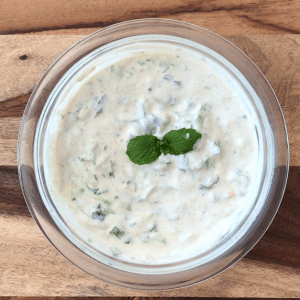 Easy Tzatziki sauce dip, Instant Pot yogurt, By Spice Cravings. This Easy Tzatziki Sauce is a creamy and delicious Mediterranean dip that is seasoned with salt, lime juice, garlic and paprika! It's a great party dip, which can be made very easily and ahead of time. You can pair it with assorted vegetables like cucumbers, cherry tomatoes, peppers,  carrots, snow peas etc. #food #foodie #foodblogger #delicious #recipe #instantpot #recipes #easyrecipe #cuisine #30minutemeal #instagood #foodphotography #tasty