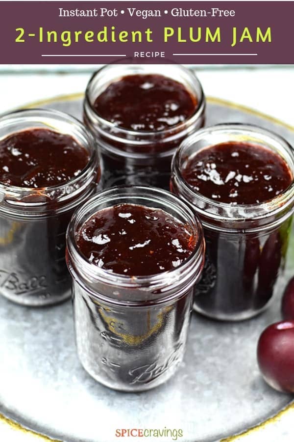 Four jars filled with homemade plum jam