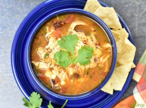 Instant pot chicken tortilla soup with melted cheese