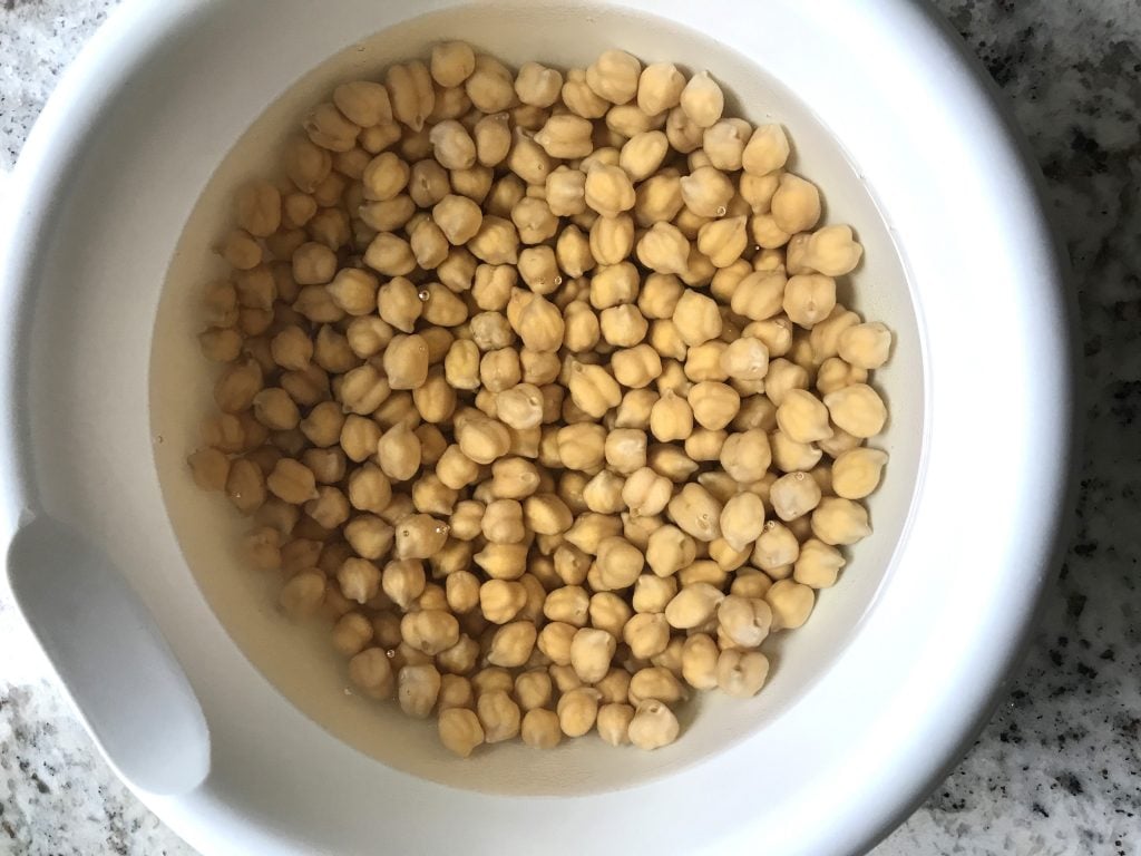 Dried chickpeas soaking in the water overnight