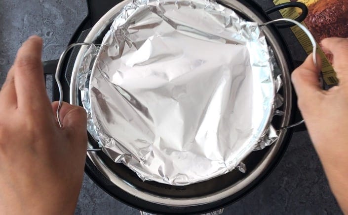 Placing the brownie pan on a trivet in the Instant Pot