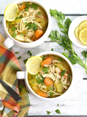 Two bowls of gluten free chicken noodle soup made in instant pot