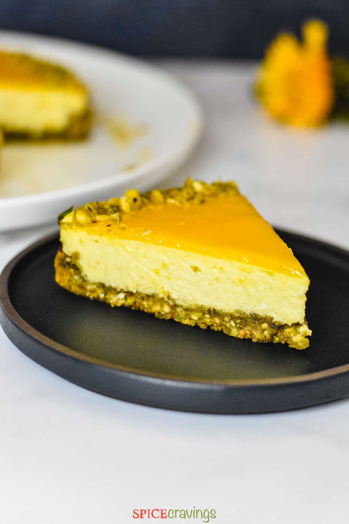 A slice of Instant Pot Mango Cheesecake
