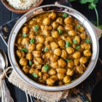 instant pot chana masala served with rice and pickled onions