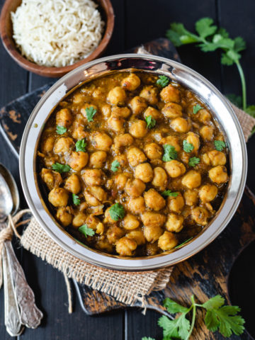 instant pot chana masala served with rice and pickled onions