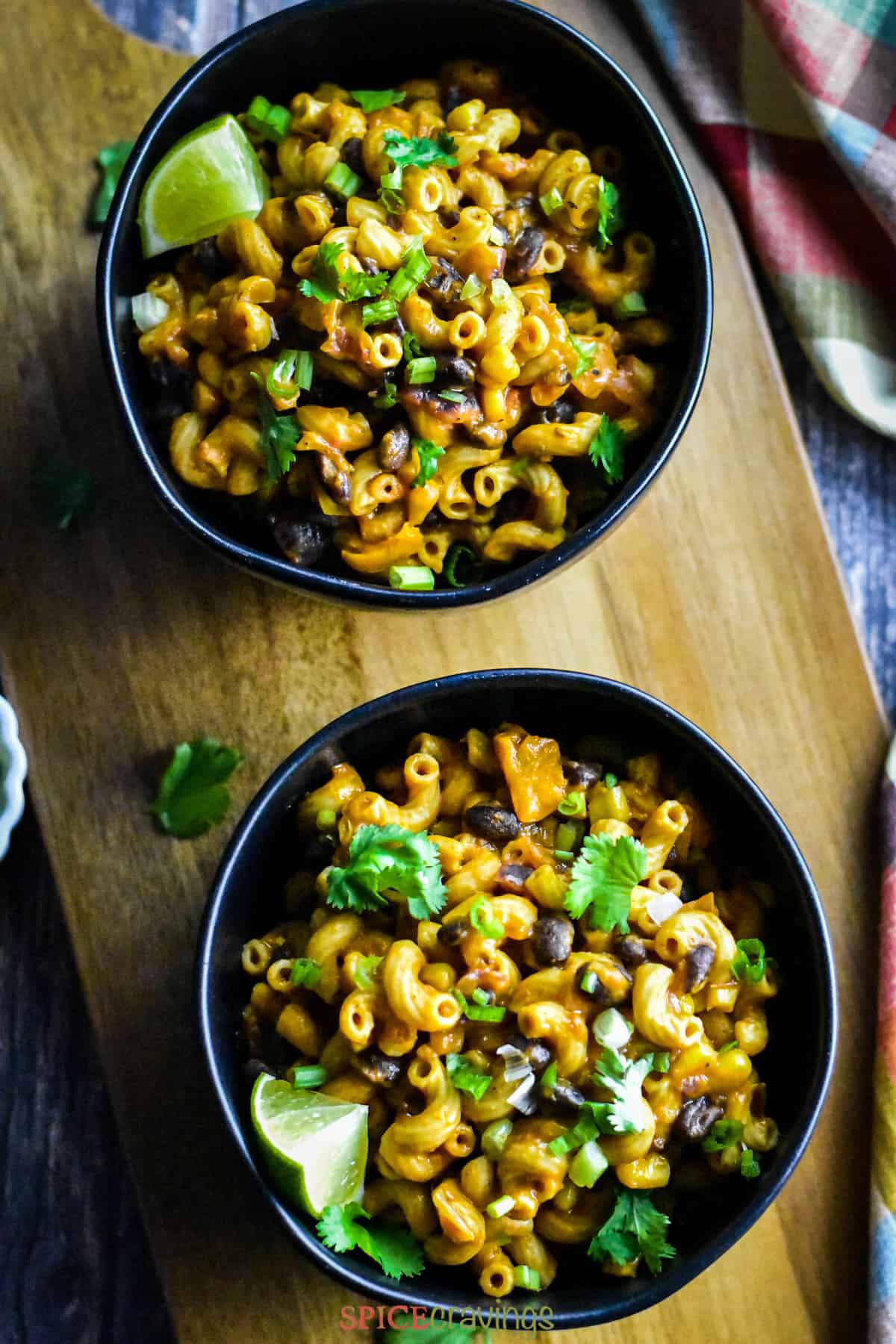 Two bowls of Cheesy Taco Pasta with black beans