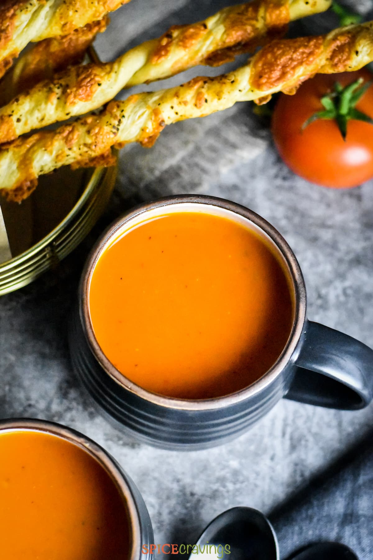 Roasted Red Pepper Tomato Soup in a black mug