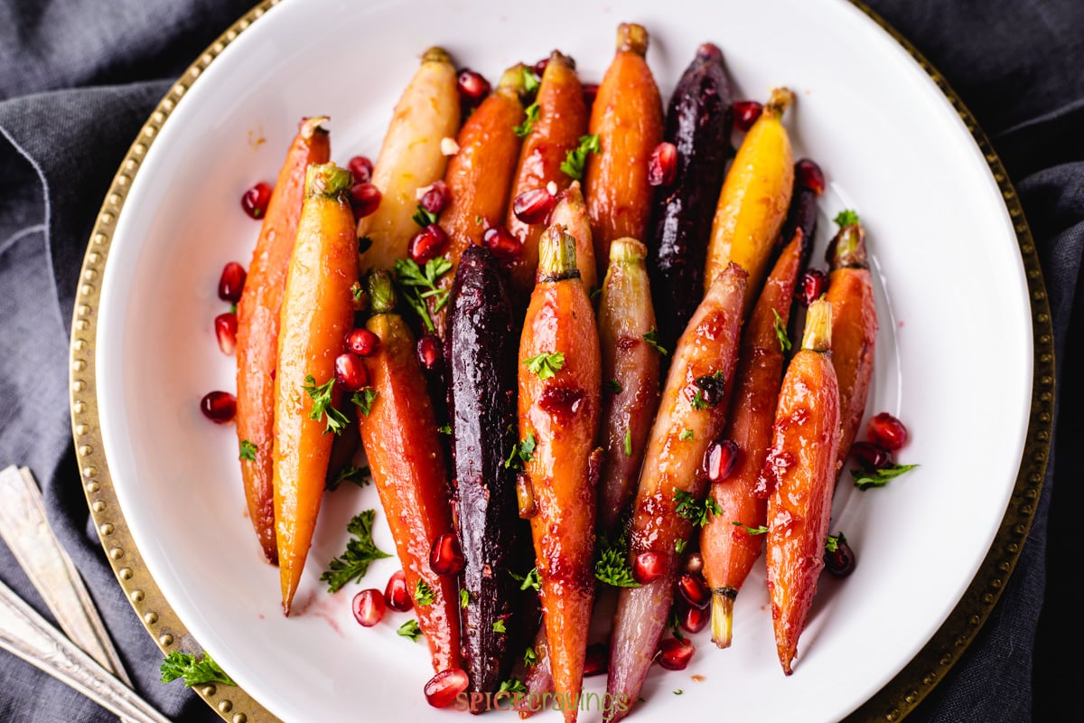 Easy thanksgiving or holiday side- honey glazed carrots served on a silver charger
