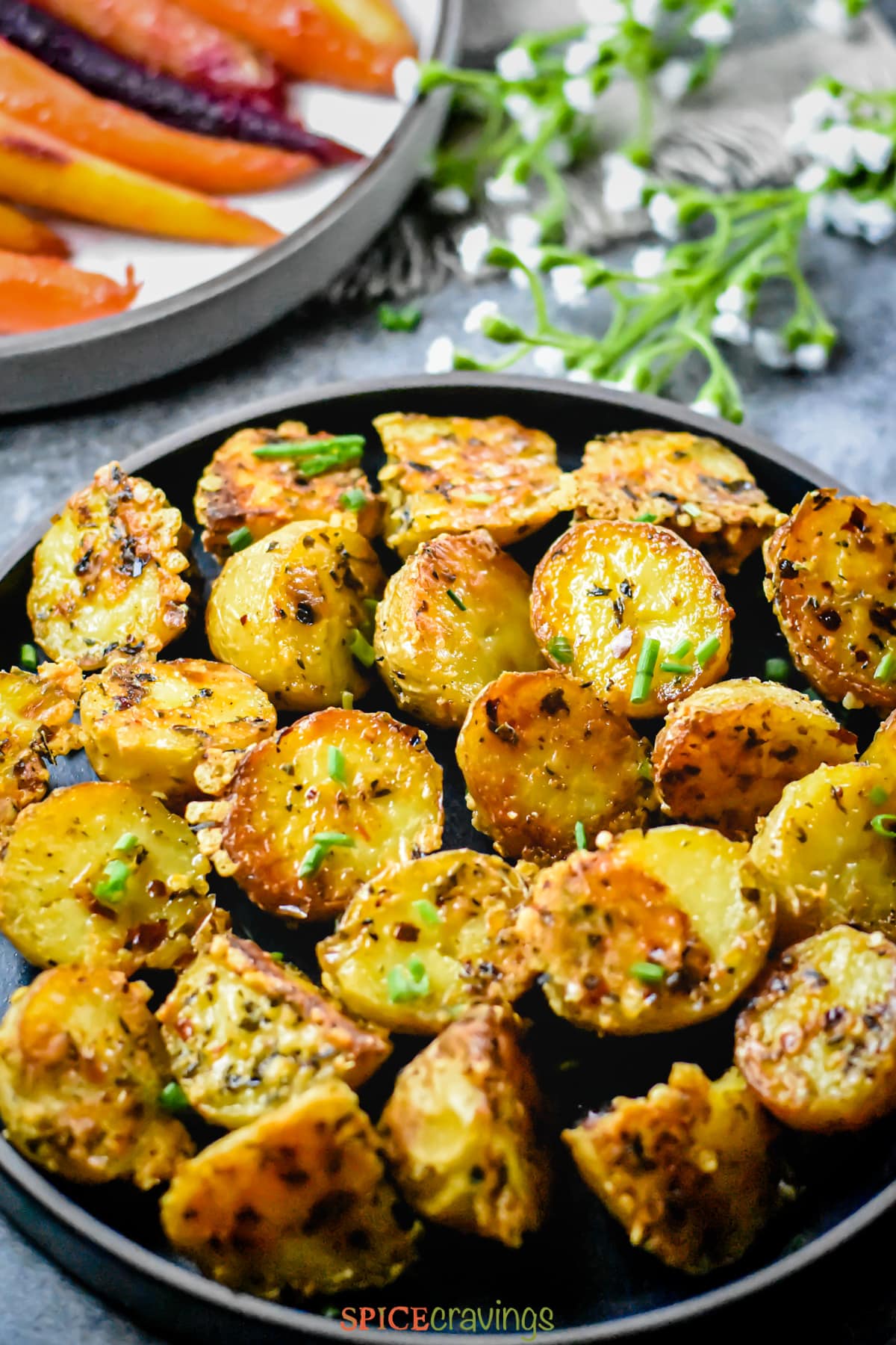 Parmesan roasted potatoes served with glazed carrots