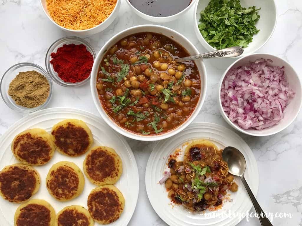 Mumbai style Ragda Pattice (white peas) served with an assortment of toppings and garnishes