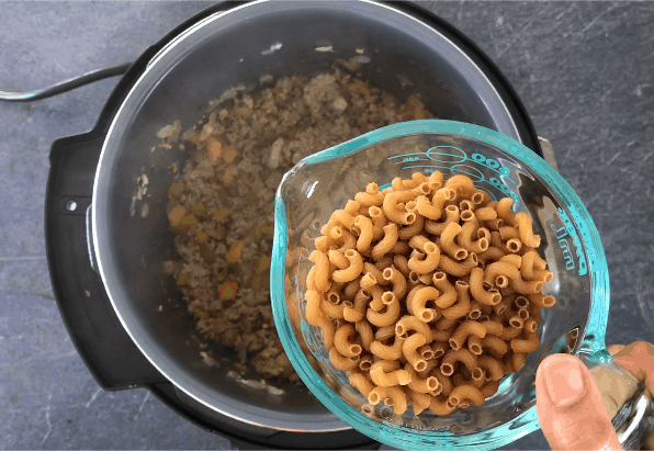 Adding elbow macaroni to the Instant pot