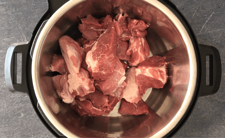 Add pork meat pieces in the Instant Pot