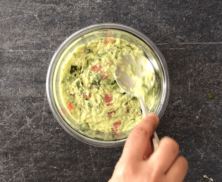Packing down guacamole in an airtight container