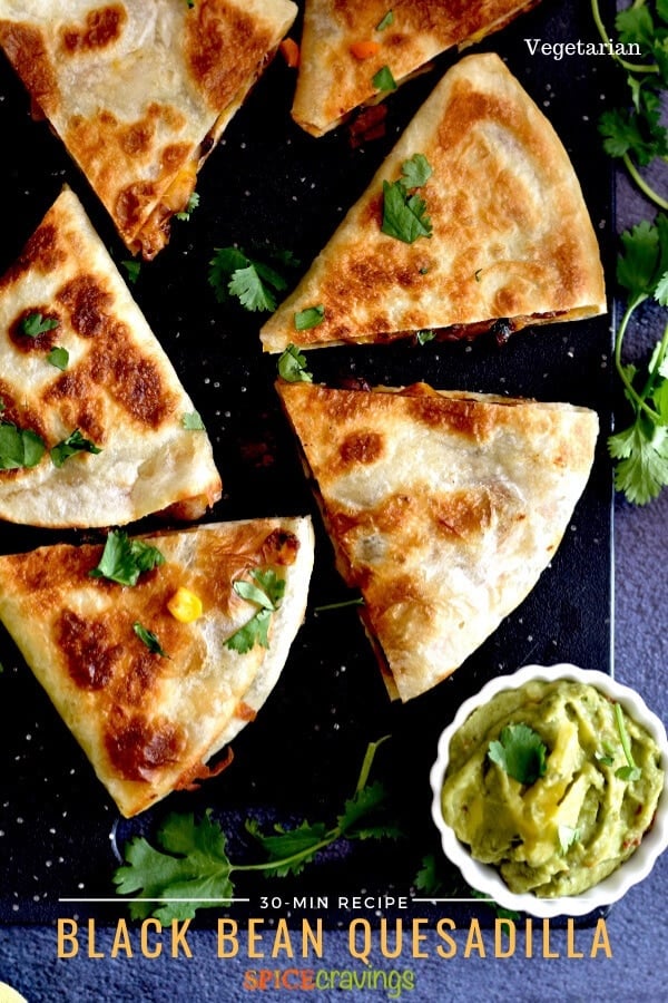 Black Bean quesadillas cut in triangles, served with guacamole
