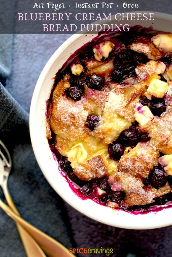 A partial view of a bread pudding bowl with blueberries