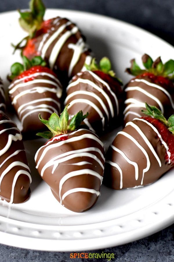 chocolate covered strawberry recipe on white plate