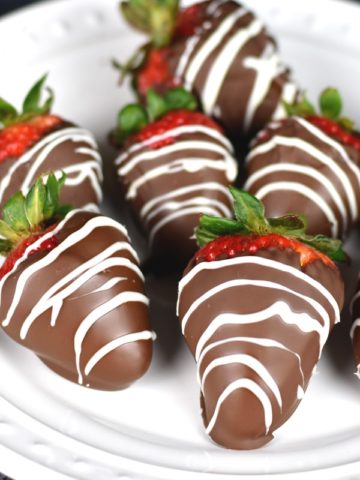 chocolate covered strawberry recipe on white plate