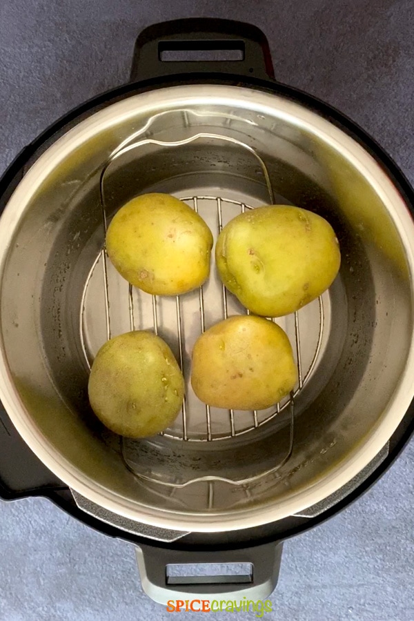 yukon golden potatoes on trivet in Instant Pot