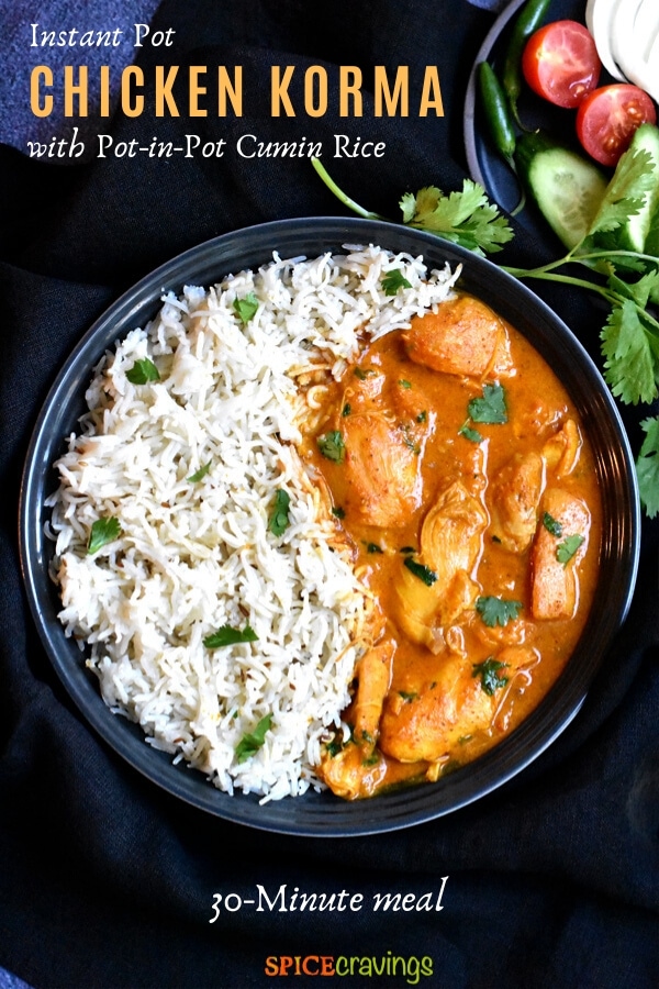 instant pot chicken korma with cumin rice in black bowl with fresh cilantro