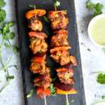 Chicken tikka skewered and grilled with peppers