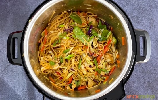 A pot full of chicken lo mein