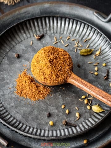 homemade Indian spice mix in small white bowl