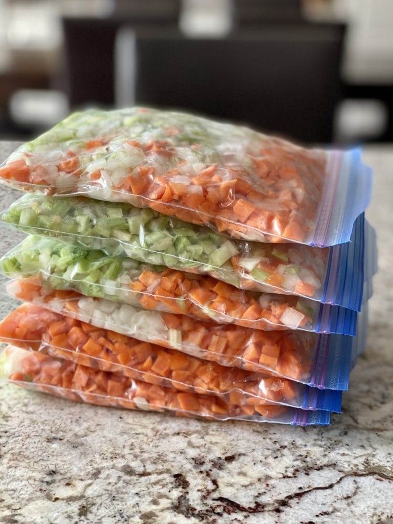 Ziplock bags filled with chopped onion, celery and carrots
