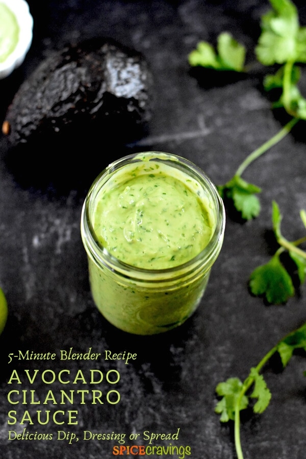 easy avocado dressing for salad in small mason jar with avocado