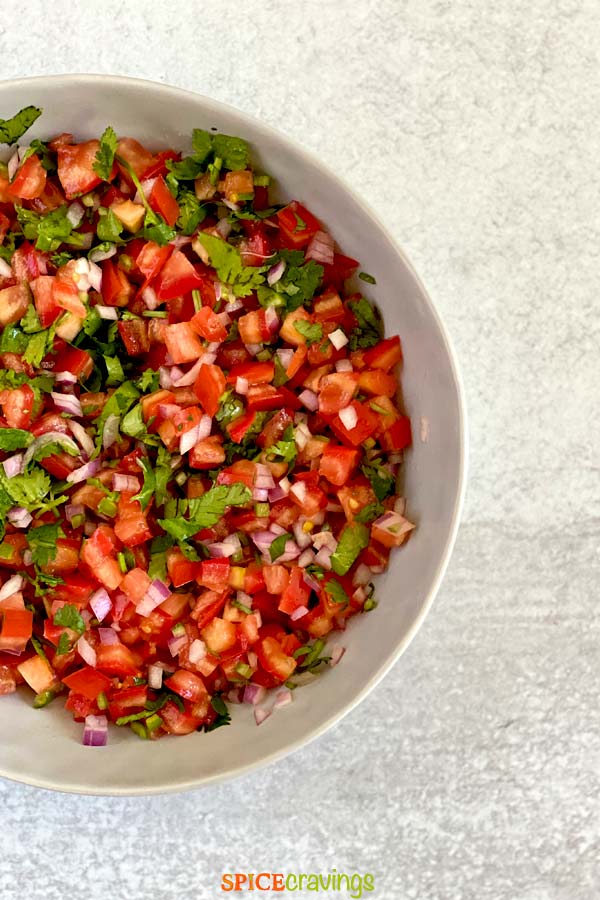 Top view of a bowl with tomato salsa